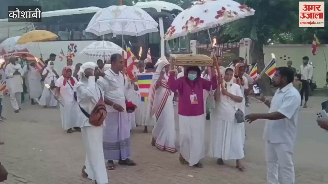 Kaushambi - Buddhist followers from Sri Lanka donated robes, a procession was taken out.