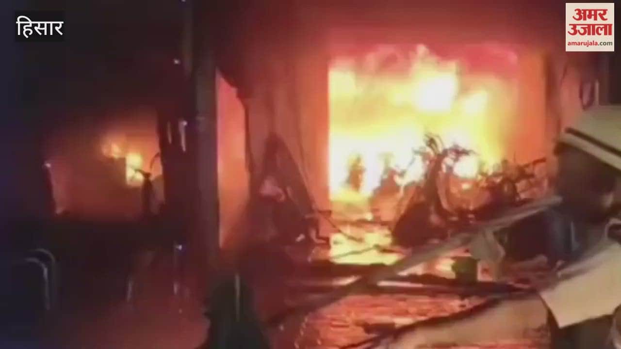 fire broke out at an e-scooty showroom in Hisar's Auto Market on Diwali night, burning 70 vehicles and 100 batteries.