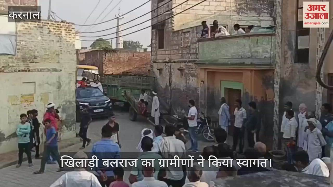 Player Balraj was welcomed by the villagers