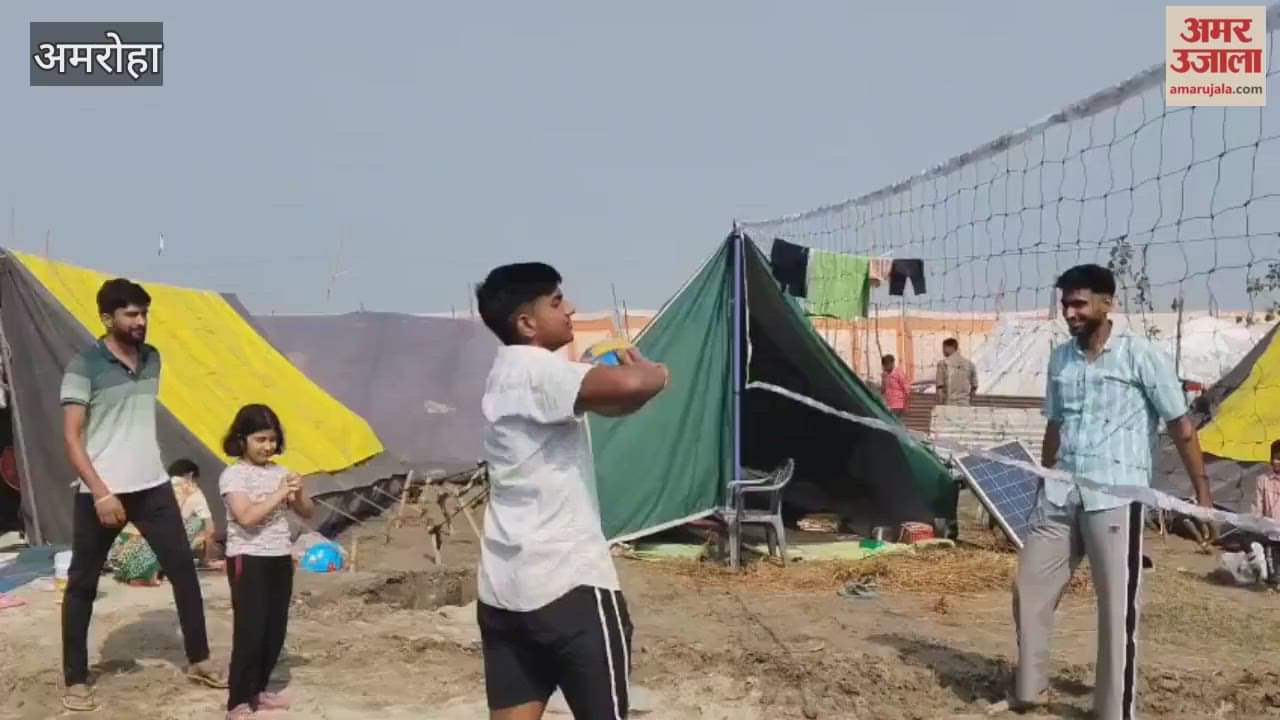 Youth spending time playing volleyball at Tigri Ganga Fair