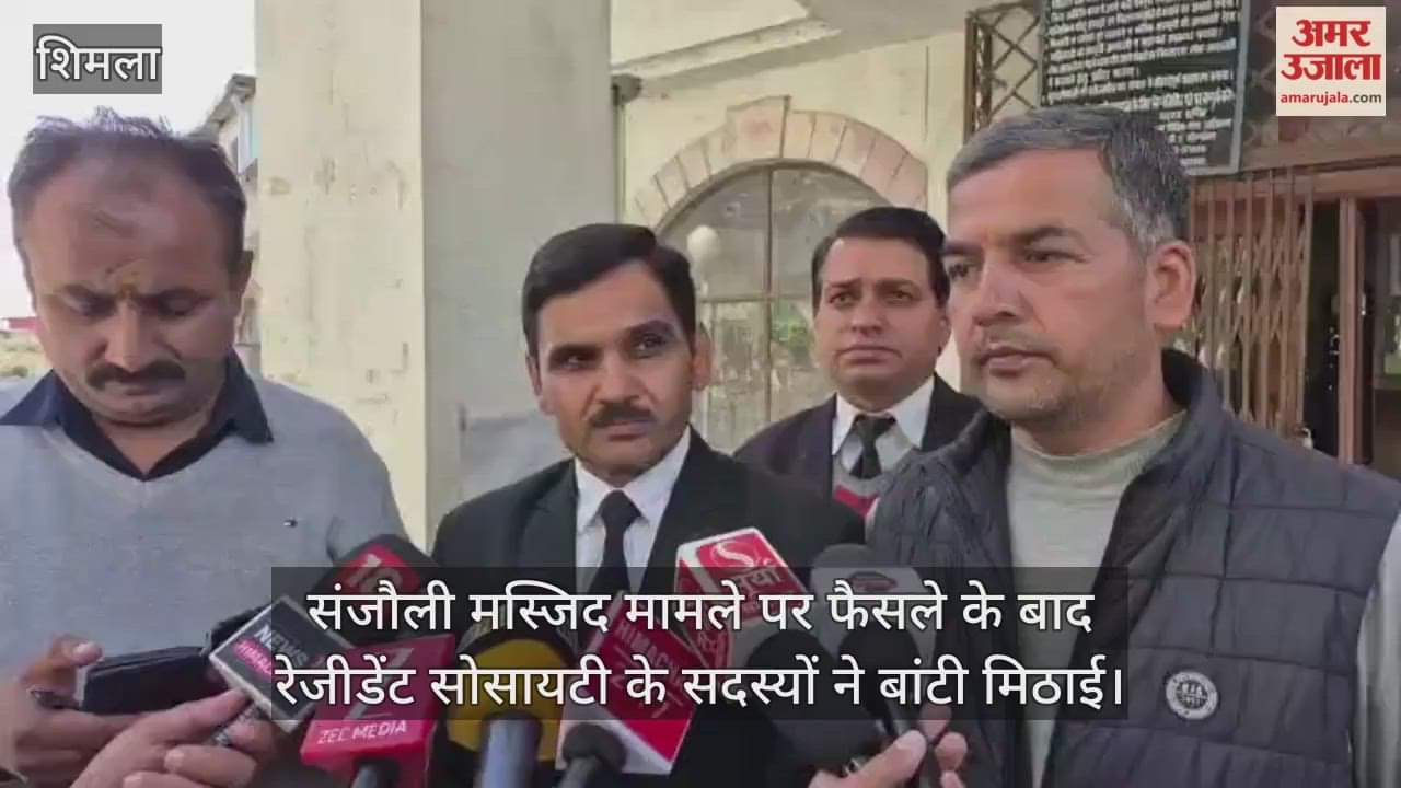 Resident society members distributed sweets after the district court's decision on the Sanjauli Mosque case.