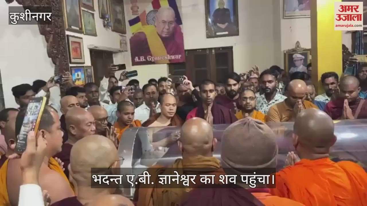 Buddhist monks gathered to pay their respects when the body arrived.