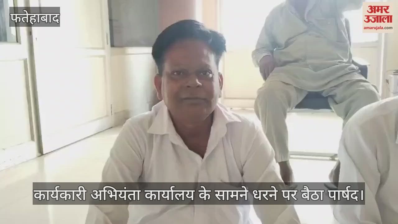 Councilor sitting on dharna in front of Executive Engineer office