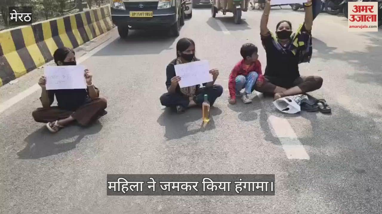 A woman sat with her daughters outside the SSP office, carrying petrol, and accused a BJP leader of molestation and assault.