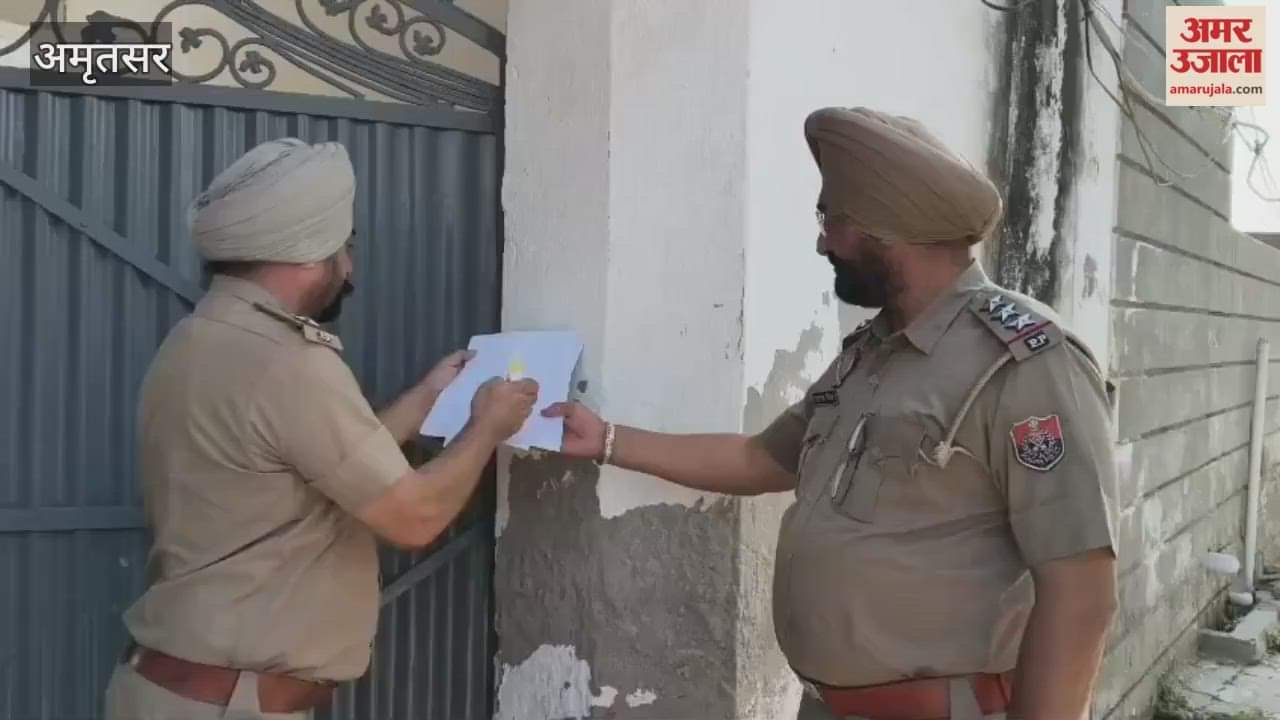 Amritsar police pasted notices at the houses of drug smugglers