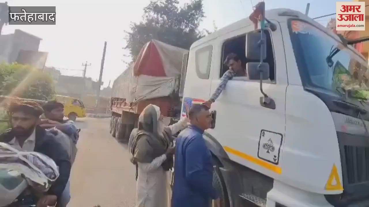 trailer truck collided with a Maruti car at Kanchi Chowk in Tohana, Fatehabad, injuring a government school teacher.