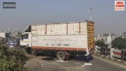 A truck rammed into a divider to save a school bus in Jalandhar, causing traffic jams on the highway.