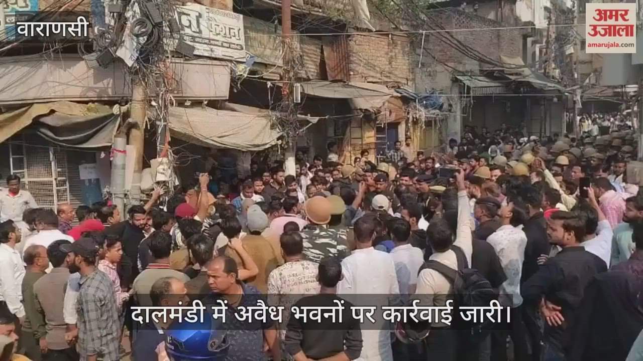 Notices pasted on buildings regarding widening of Dal Mandi in varanasi