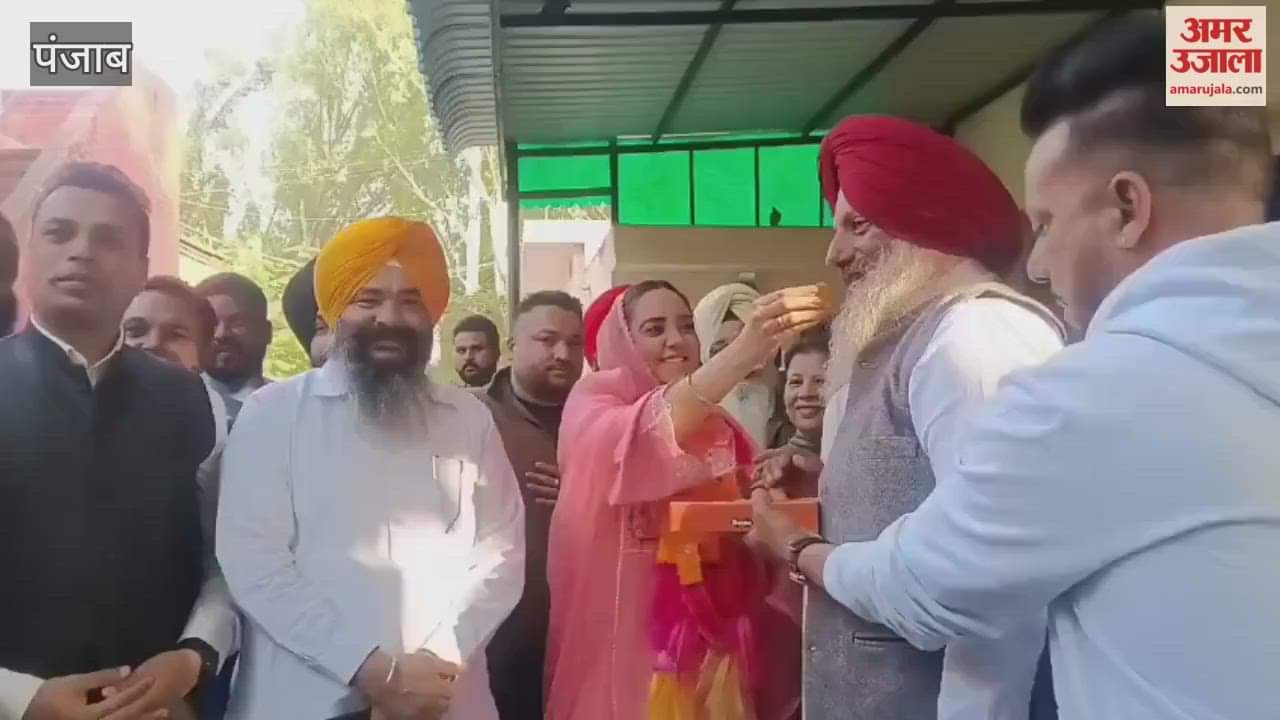 AAP MLA distributes laddus in Moga after winning the Tarn Taran by-election.