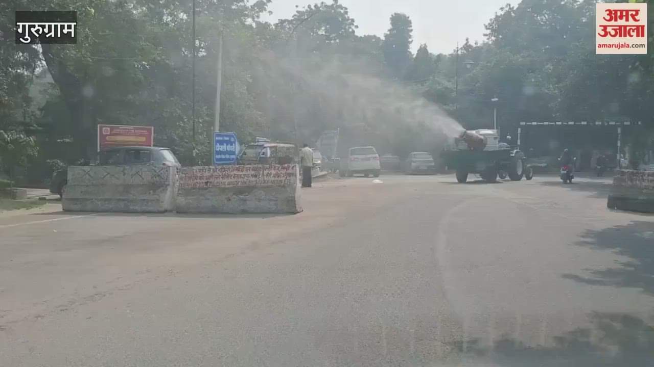 Municipal Corporation is spraying water from tankers on roads in gurugram