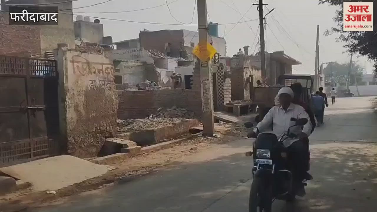 Residents are removing illegal structures blocking road in Faridabad