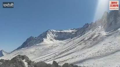 People are  Reaching Devtal amidst pleasant weather, the beautiful view of the snowy valleys is visible.