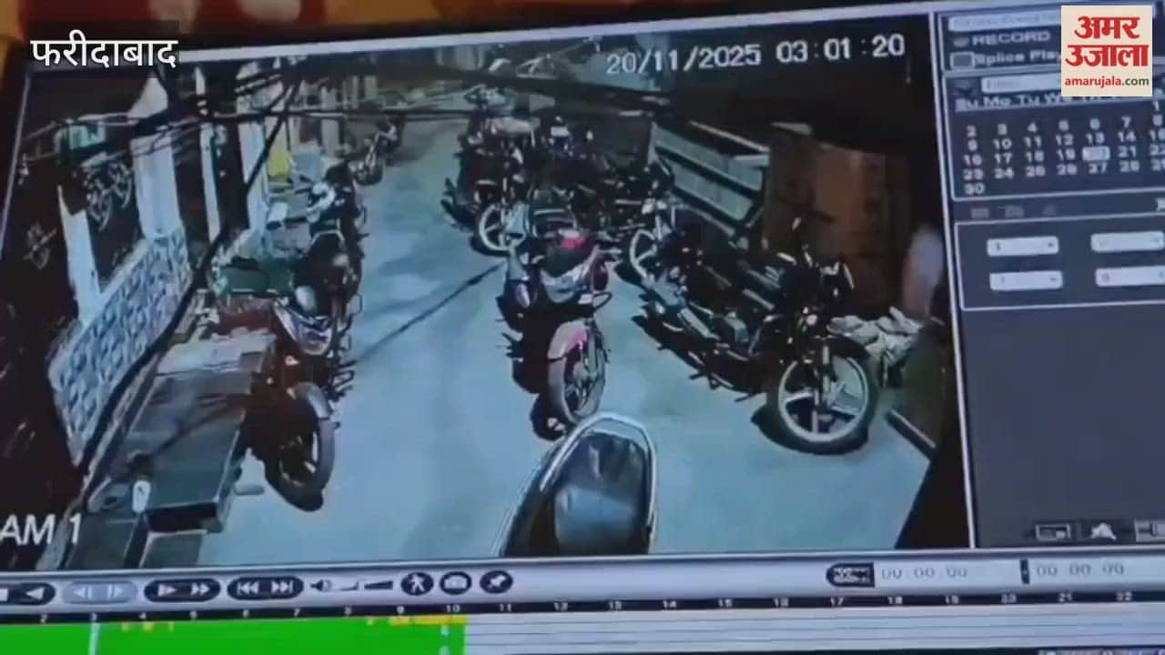 A motorcycle parked outside a house was set on fire, a man was caught on CCTV
