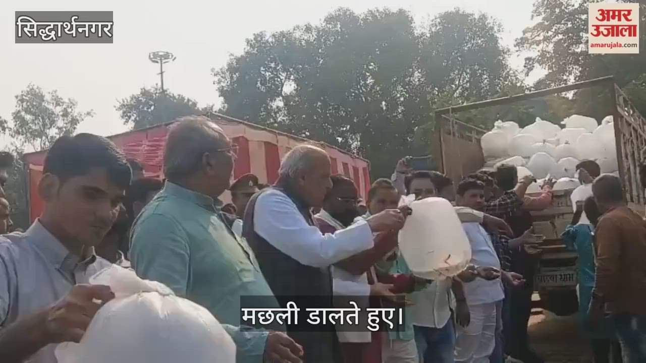 Cabinet minister throws fish in the river with MP