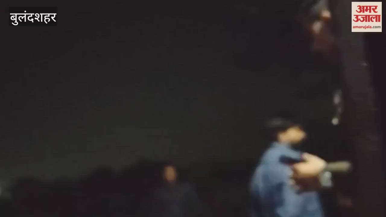 police officer filmed a man holding a pistol during a dispute between a husband and wife an investigation has begun