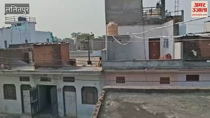 Video: High-tension line wires dangling like death on rooftops in Lalitpur
