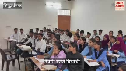 Children are busy preparing for the exam, preparing with model papers.