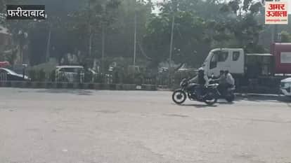 corporation sprayed water on major roads in Faridabad with an anti-smog gun machine