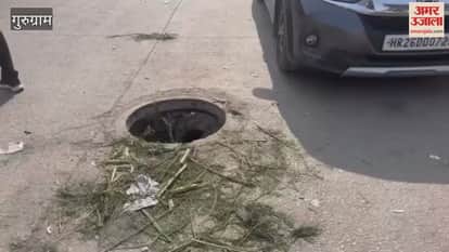 Sewer cover opened on road near bus stand in Gurugram