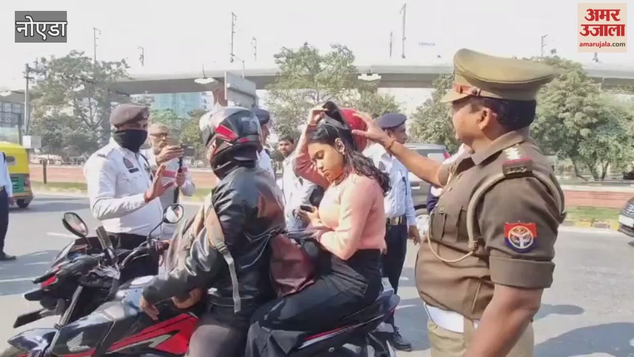 Greater Noida Traffic police distributed helmets at Pari Chowk and launched an awareness campaign.
