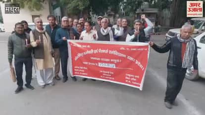 Candle march held demanding pension revision