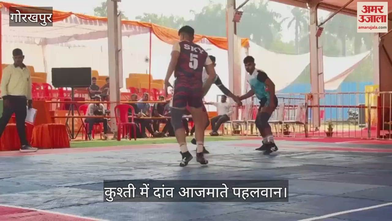 Wrestlers engaged in scoring points in the wrestling competition by betting