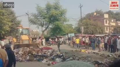 Sanitation workers angered by beating of colleague dumped garbage on road