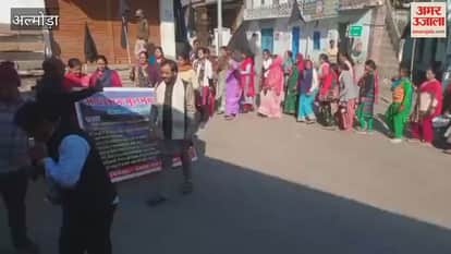 A procession with black flags was taken out in Syalde almora