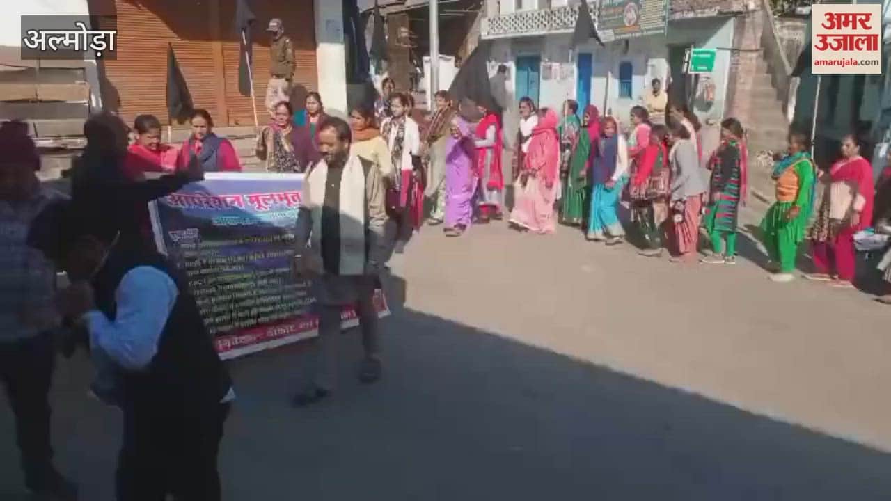 A procession with black flags was taken out in Syalde almora