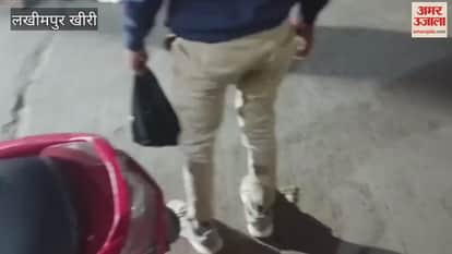 drunk man dragged a young man on the street video goes viral in lakhimpur kheri