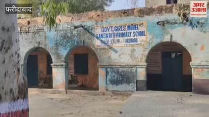 Children studying in a dilapidated primary school building
