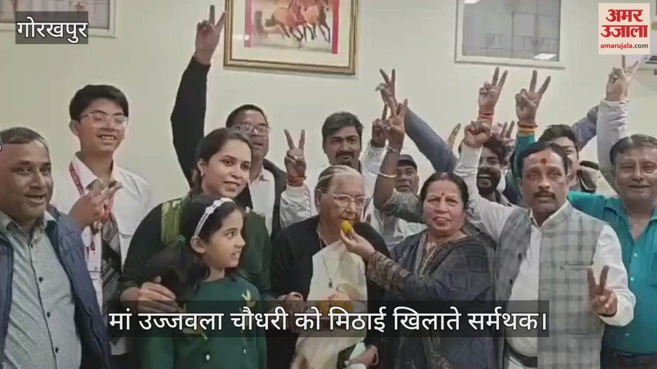 Pankaj Chaudhary's family is filled with joy as well-wishers congratulate his mother by feeding her laddus.