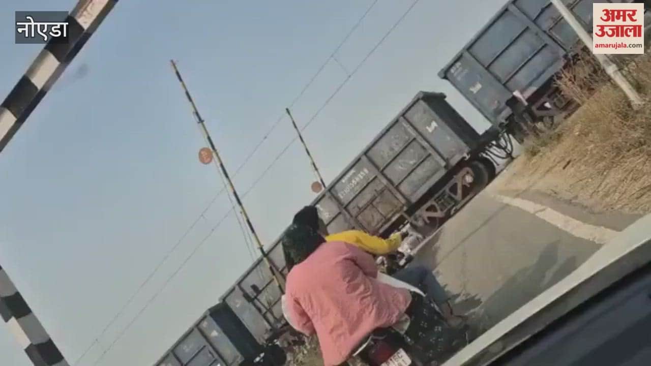 Level crossing gates remain open even when trains are passing in Greater Noida