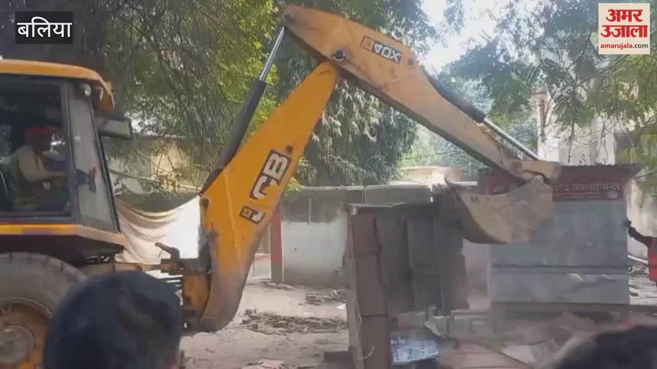 administration bulldozer was deployed at collectorate illegal shops removed