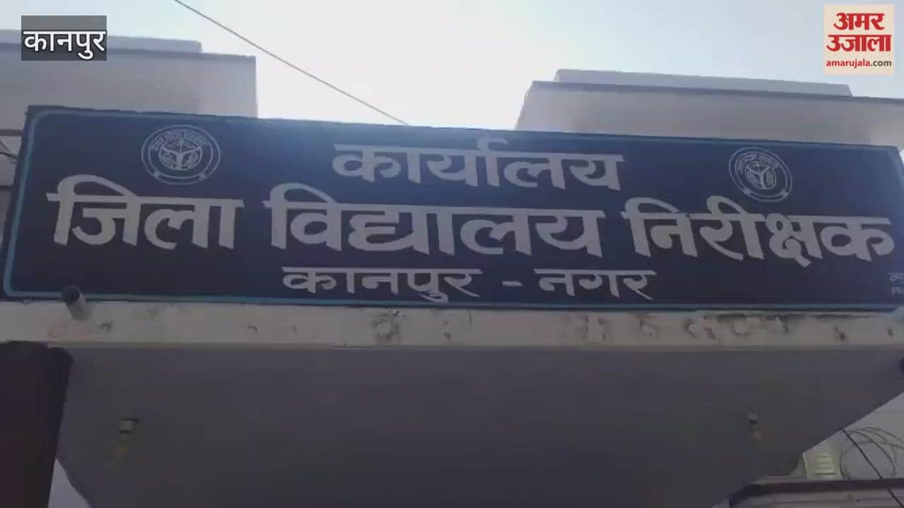 Vocational teachers from Bilhaur Inter College stage a sit-in at the District School Inspector's office