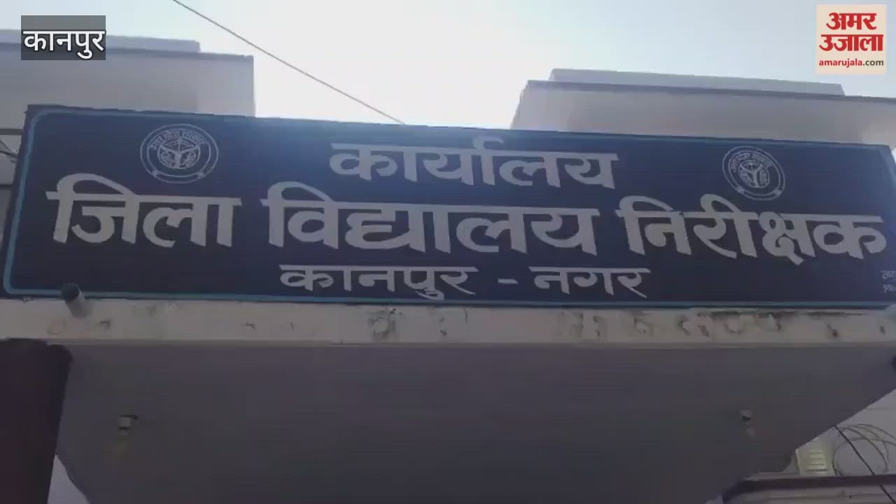 Vocational teachers from Bilhaur Inter College stage a sit-in at the District School Inspector's office