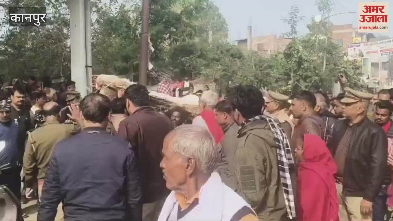 Family blocks road with body of young man killed in accident