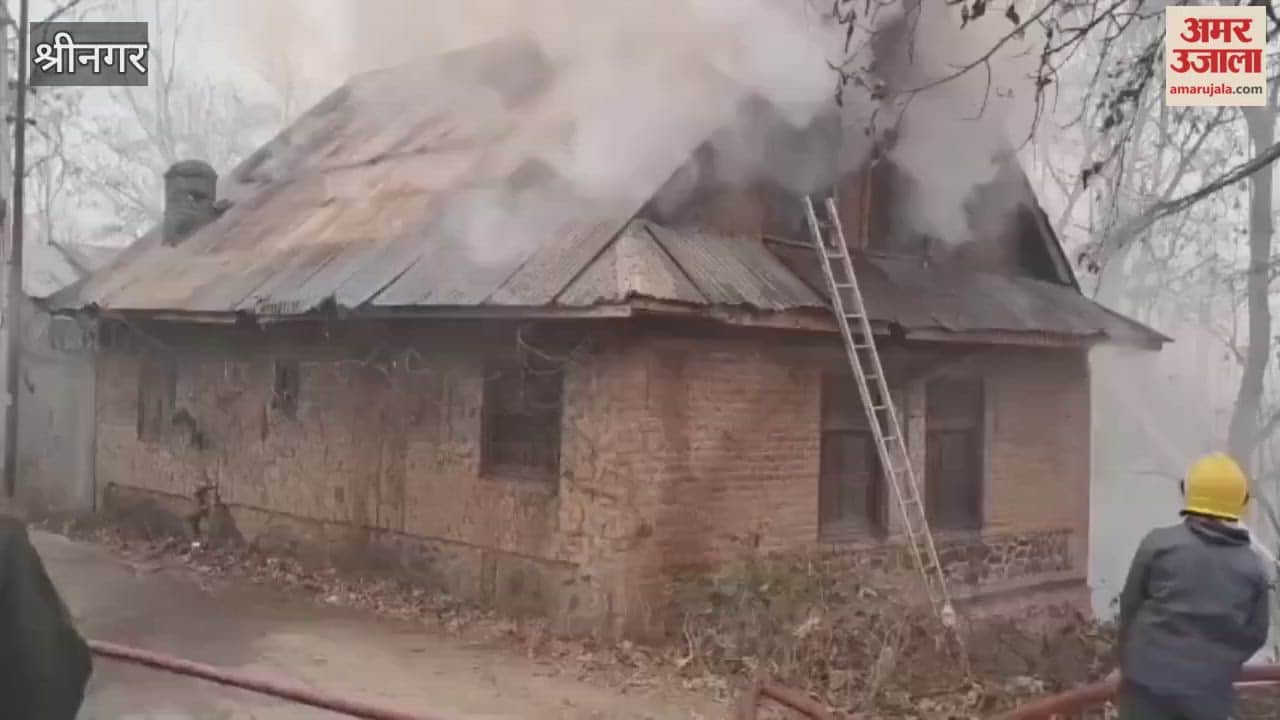 Fire erupts in Wakura Ganderbal district, Ganderbal; locals rush to control flames.