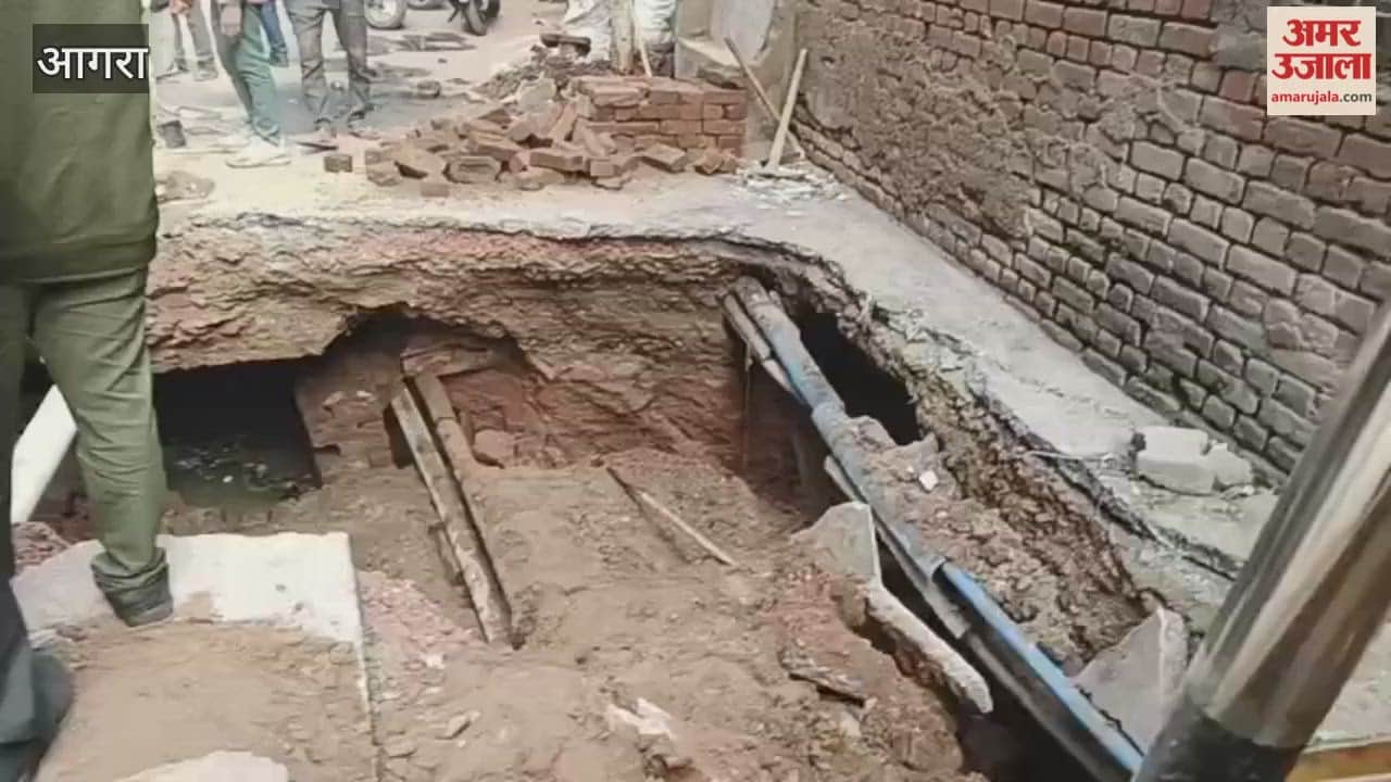 road suddenly caved in people were surprised to see such a deep pit