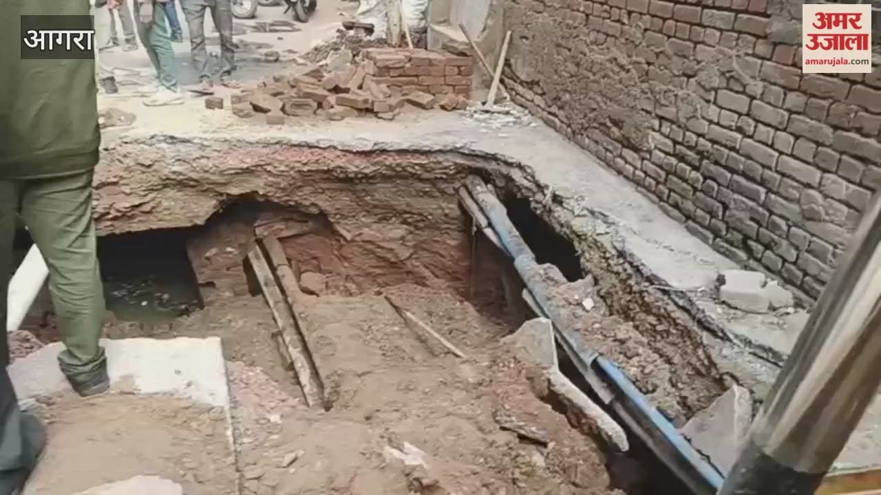 road suddenly caved in people were surprised to see such a deep pit