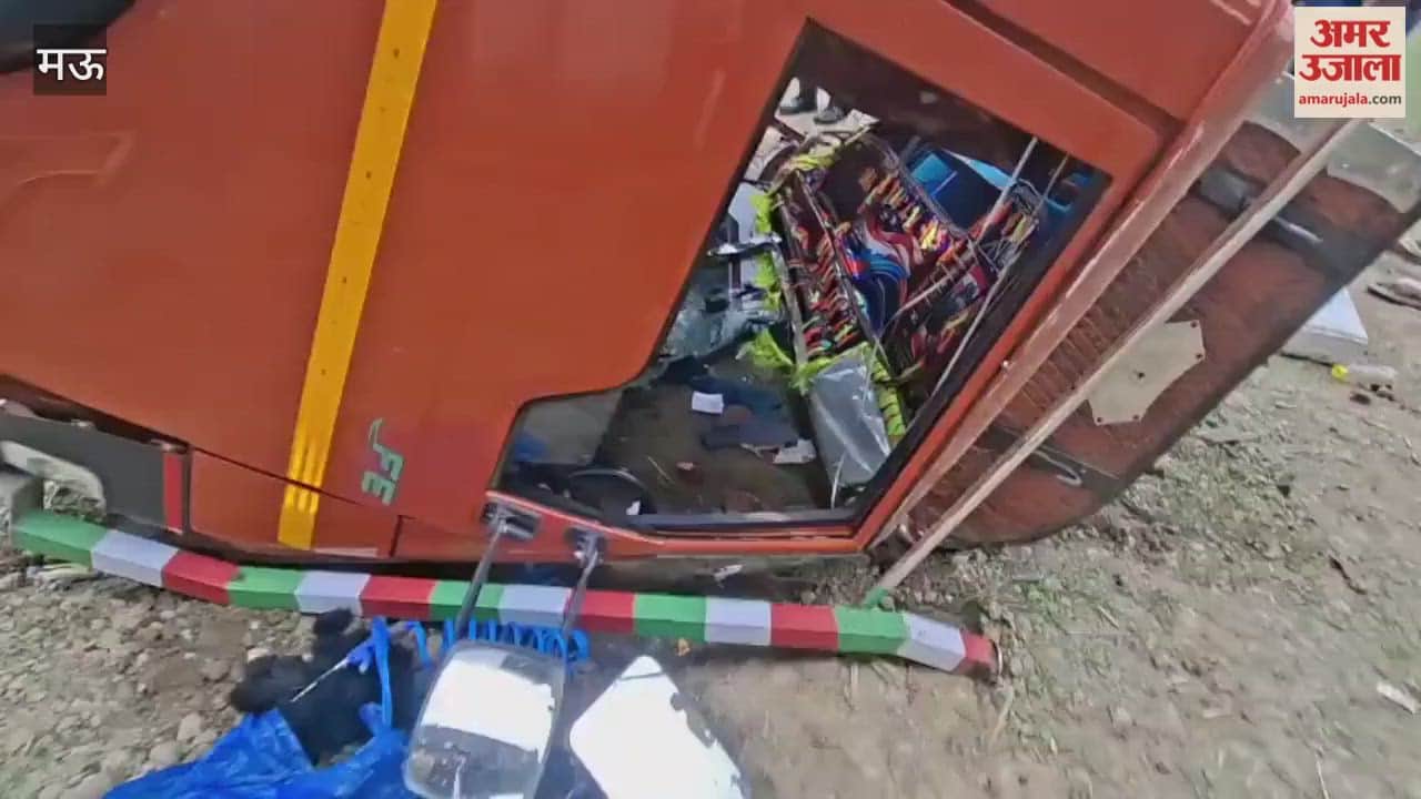 Truck breaks through overpass railing and falls 40 feet below driver injured