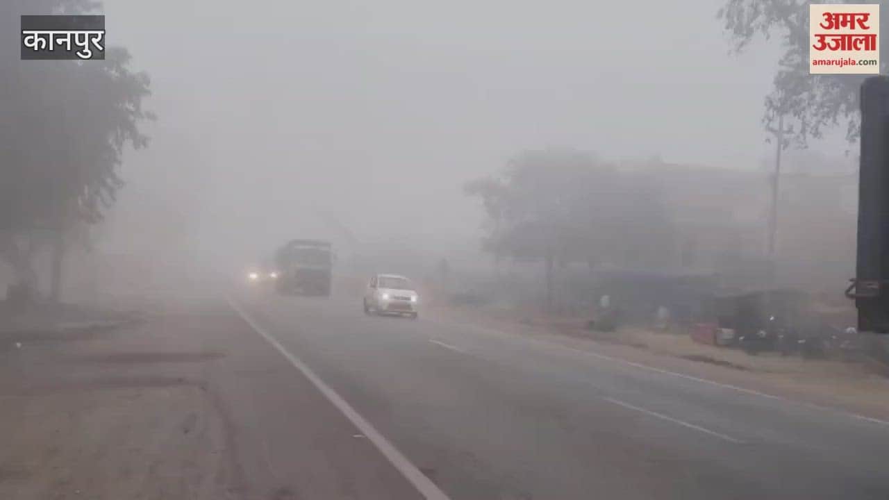 Vehicles travel with headlights on along the Kanpur-Sagar Highway