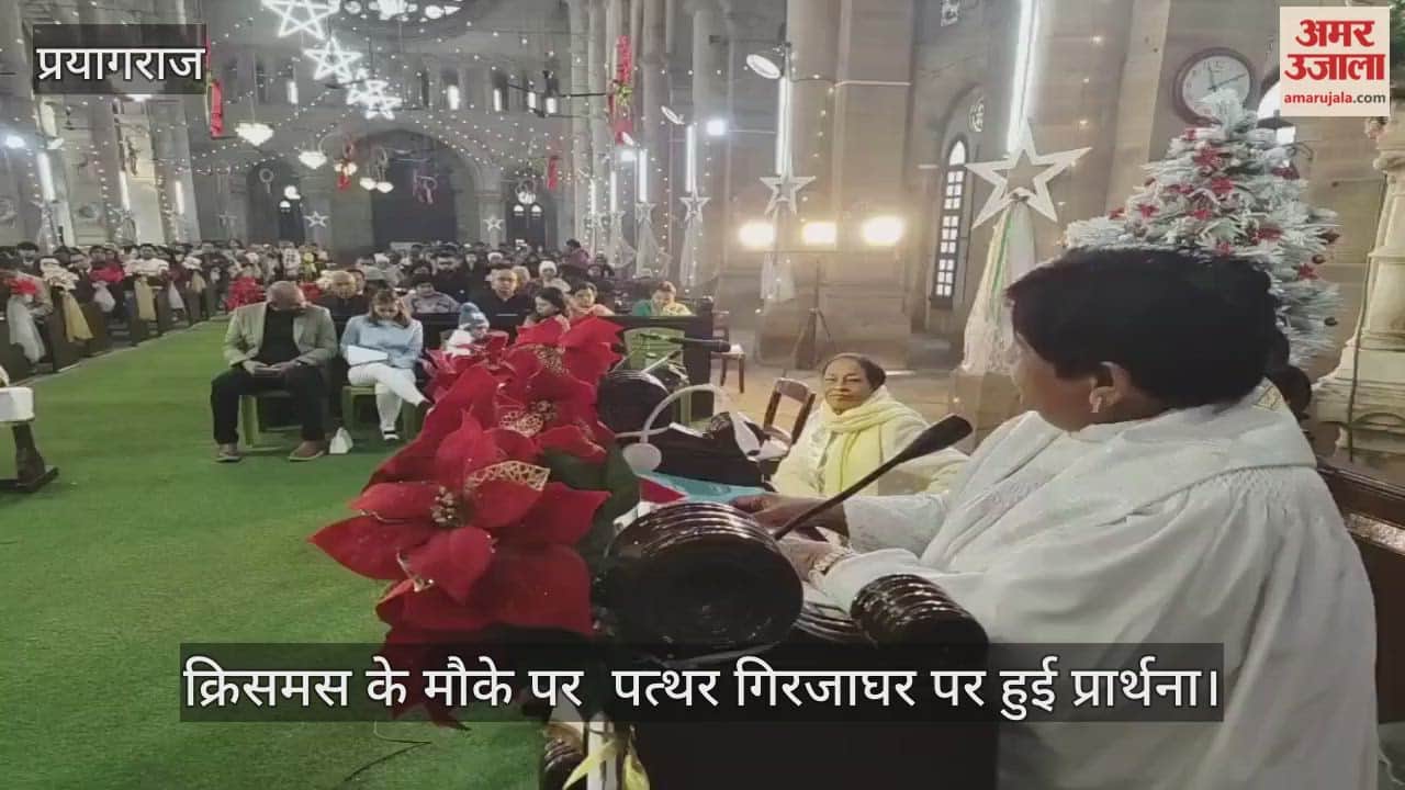 Church bells rang during the midnight service, and candlelight illuminated the church.