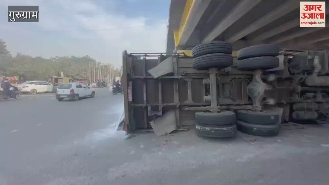 An overloaded truck overturned after losing control while trying to avoid hitting a car