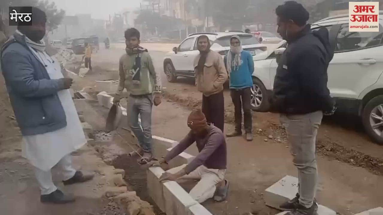 Meerut: Divider construction work continues on Garh Road.