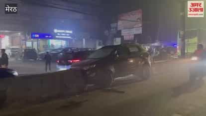 A road accident occurred outside Ganga Plaza, a car got stuck in a cut in the divider, leaving passersby stunned.