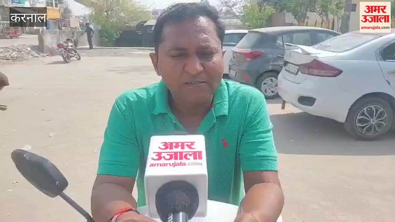 People queue up outside the gas agency for LPG cylinders.