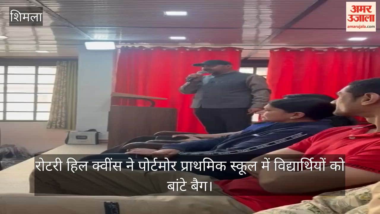 Rotary Hill Queens distributed bags to students at Portmore Primary School