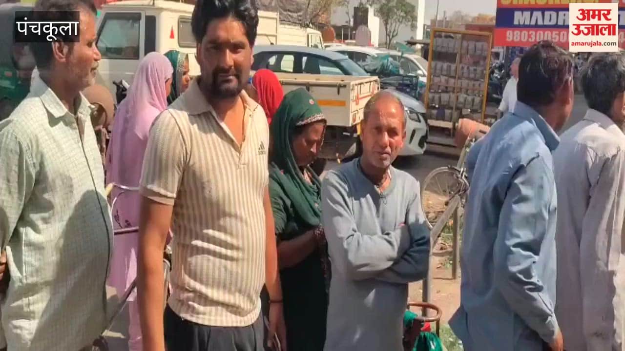 Crowds gathered outside the Bharat Gas office in Panchkula to collect gas cylinders.
