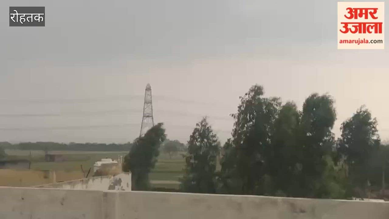 Heavy rain accompanied by strong winds in Rohtak.